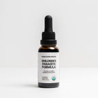 Bottle of 'Children's Parasite Formula' on a white background