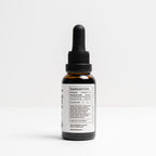 Bottle of 'Children's Parasite Formula' on a white background