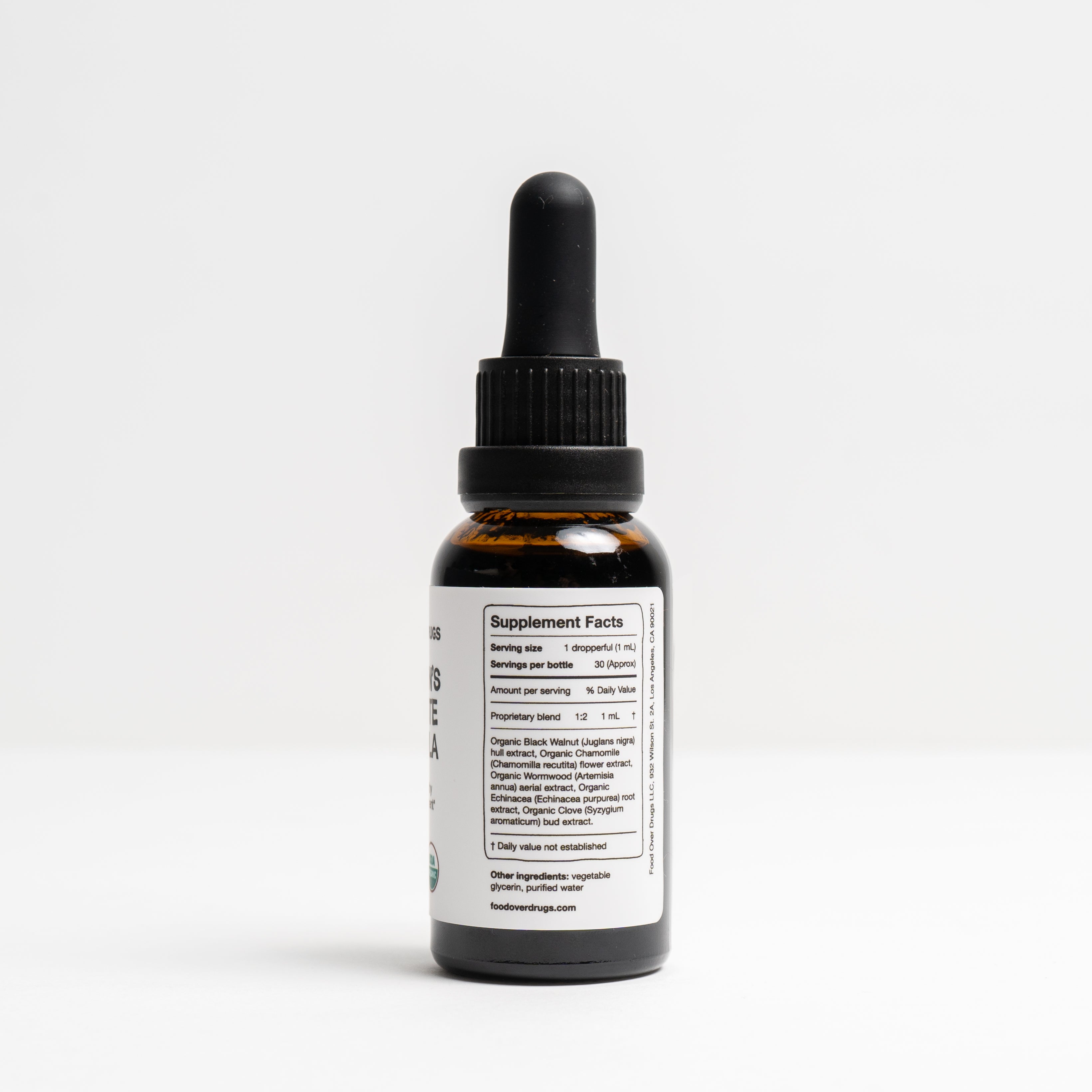 Bottle of 'Children's Parasite Formula' on a white background