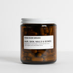 Amber jar of Hair, Skin, Nails & Bones supplement.